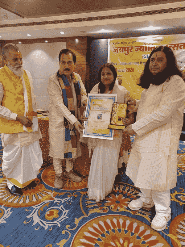 Award ceremony at Jaipur Jyotish Utsav with certificate and trophy